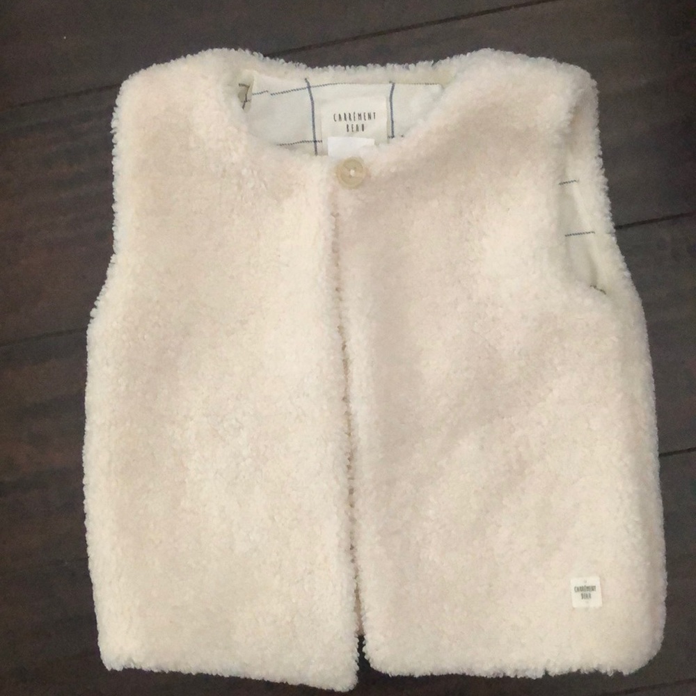 Cream vest feels like carpet material